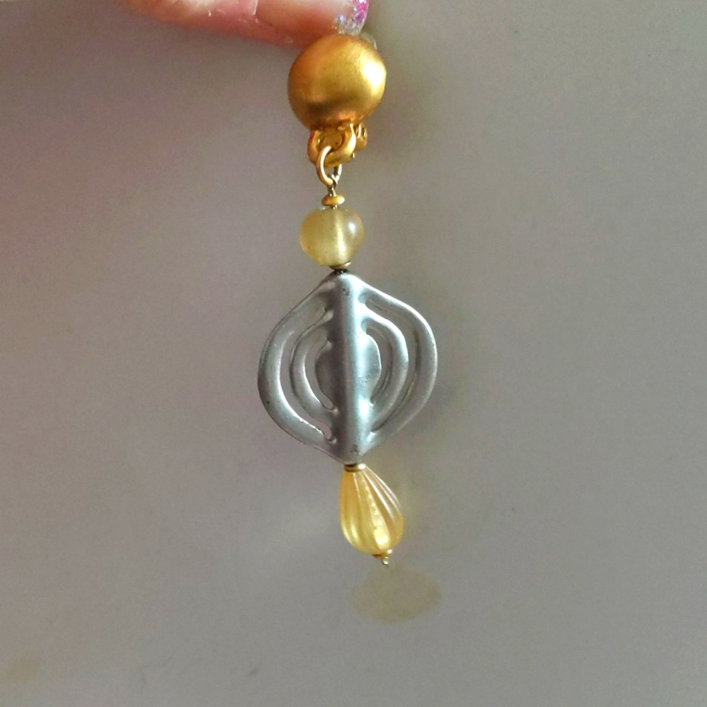 Costume clip on hanging earrings.